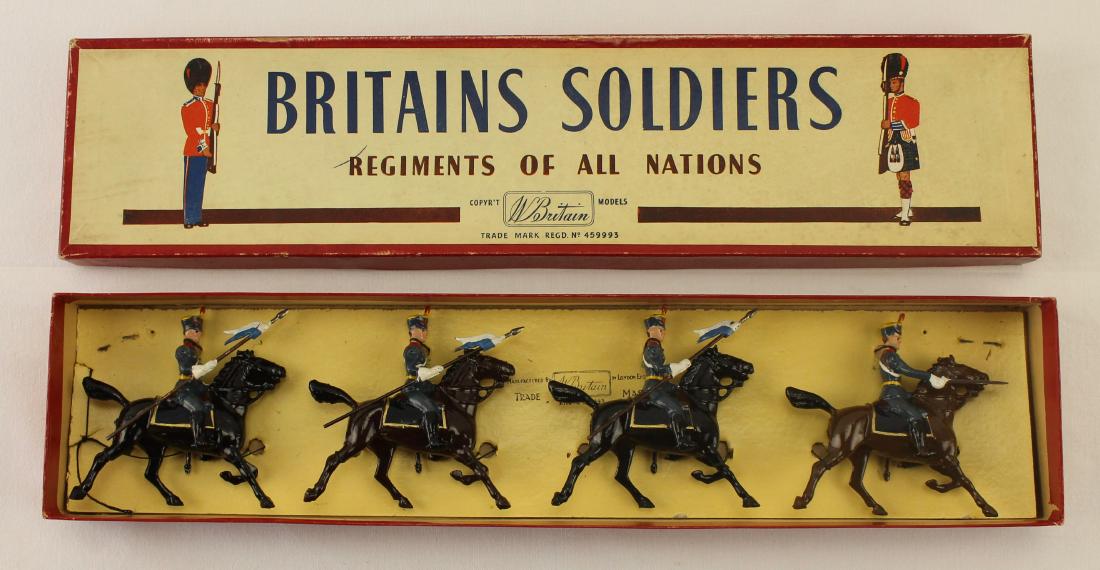 Britains Set #217 Argentine Horse Guards: Post War set. 4 pieces. Condition near mint - still tied to card. ROAN box good to very good.