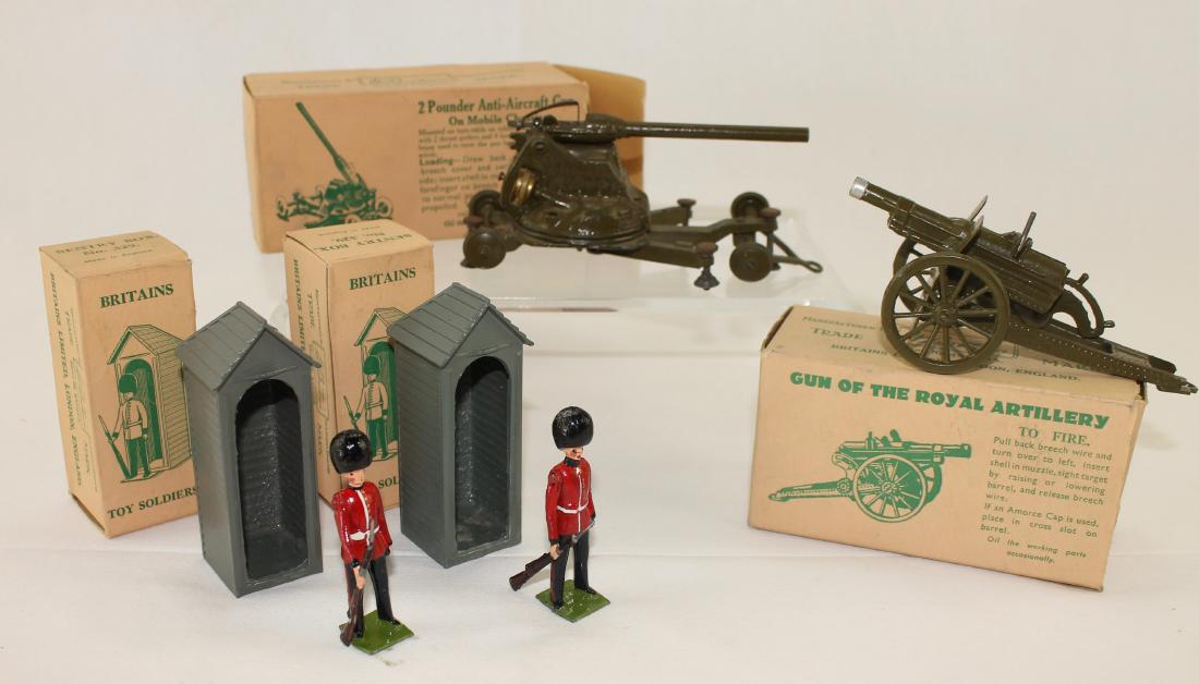 Britains Lot Set #329 Sentry and Royal Artillery: Post War Lot includes 2 Set #329 Sentry with Guard House, Set #1717 Anti Aircraft Gun on Chassis, and Set #1292 Royal Artillery Gun. 7 pieces. Condition very good to excellent, lacks mounting screws f