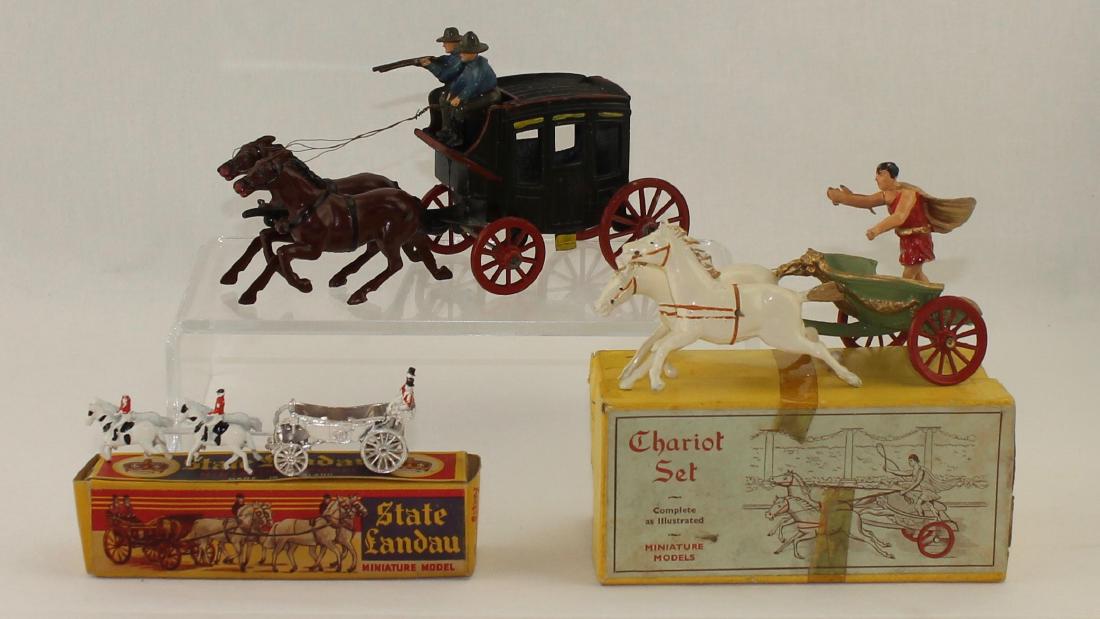 English Lead Lot Johillco Taylor & Barrett: Lot includes Taylor & Barrett Racing Chariot in box, Johillco Stage Coach, and a small incomplete Benbros State Landau Coach in box. 7 pieces. Condition very good to excellent. Racing Chariot driver m