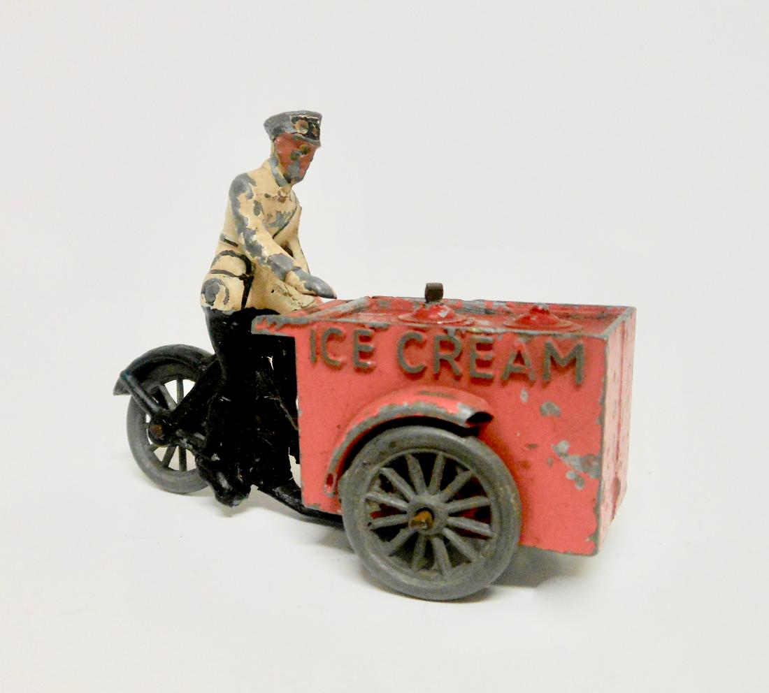 Morestone Ice Cream Vendor Tricycle: Circa 1950. Unusual pink version. 2 pieces. Good condition. Unboxed.