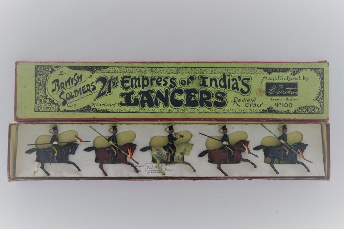 Britains #100 21st Lancer with trumpeter: Review Order, dated in original printers decorated box, (1920), Good, box fair-good, small splits to some lid edges, 5 pieces