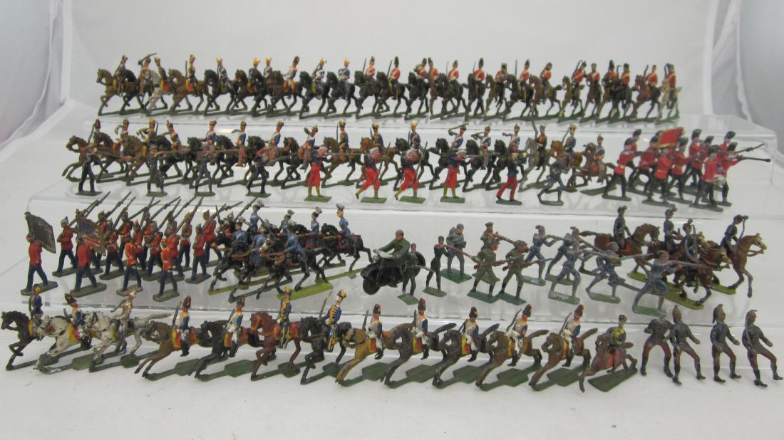 25-30mm Demiround Cavalry & Infantry: 25 & 30mm Demiround assorted Cavalry & Infantry. Horses are beautifully sculpted. 107 pieces. Condition very good to fair, 2 bayonets, 4 rifle barrels, 7 swords, 2 tails, 1 head, 5 lance arms gone.