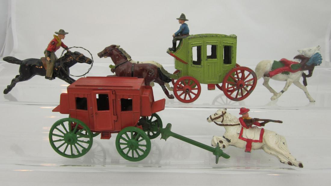 John Hill Co. Stagecoach with Mounted Figures: Johill stagecoach with driver, 2 cowboys & 1 Indian with horses, along with Crescent horseless stagecoach. 5 pieces. Condition good to very good, Indian no tail, coach horses both 1 leg gone, & no gua