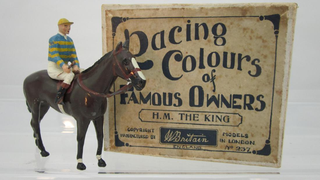 Britains Set #1463 Racing Colors Horse & Jockey: #1463 Racing Colors Anthony de Rothschild. 2 pieces. Condition very good to good, in wrong (#237 H.M. the King) box.