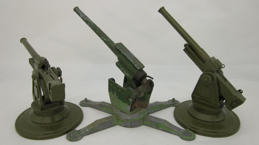 Astra & 2 Japanese Copies of Bullock Cannons: Japanese copies of Bullock AA guns & 1 Astra gun. 3 pieces. Condition good to very good, Astra major paint loss, 1 Japanese gun metal beginning to distress