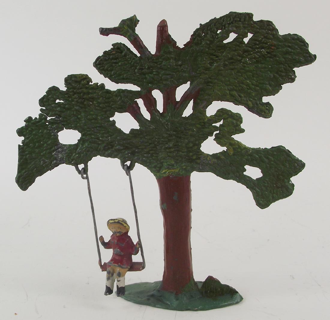 Johillco Girl on Swing: 1 piece, good condition with wear. Maker unknown.
