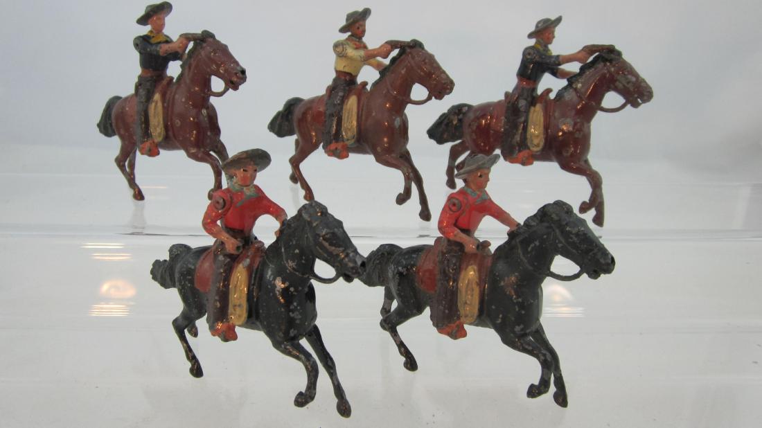 Britains Set #179 American Cowboys Mounted.: Mounted Cowboys at gallop. 5 pieces. Condition good, 1 matchstick mended, 1 foreleg repaired, 1 casting flaw on tail, 2 no wire lassos. No box.