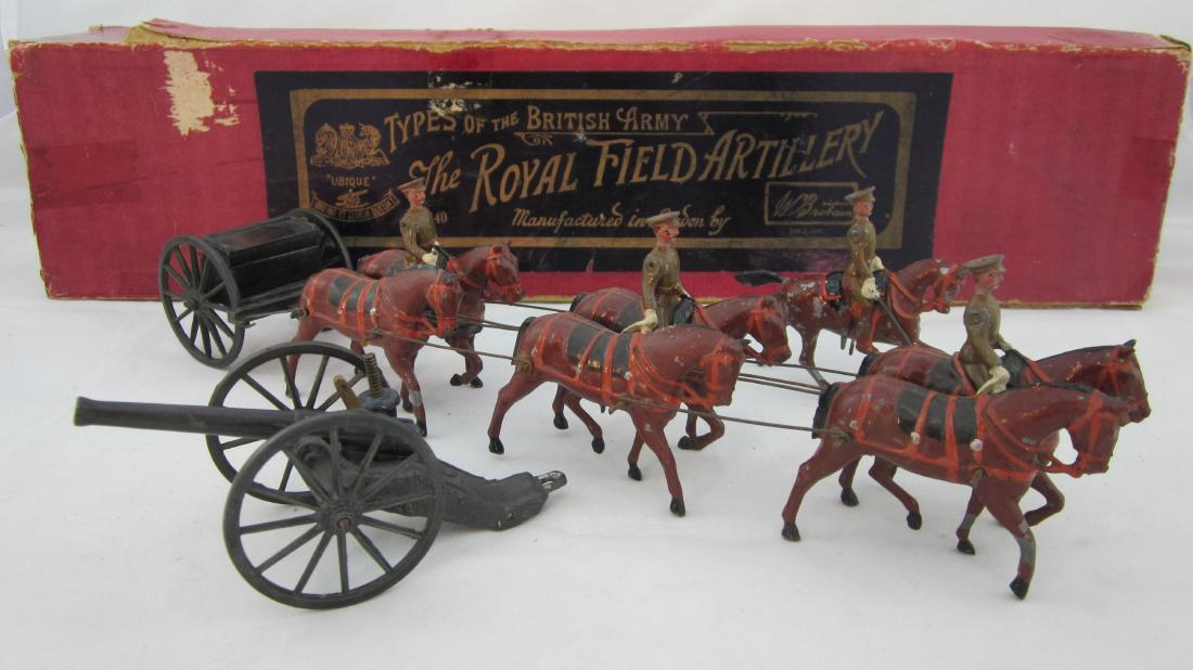 Britains Set #1440 Royal Field Artillery, Walk.: Royal Field Artillery, Active Service Order, at walk, breast harness, peak caps, cantering officer dated 1903, fumed metal early gun & limber. 9 pieces. Condition excellent, 1 whip top gone. Early box