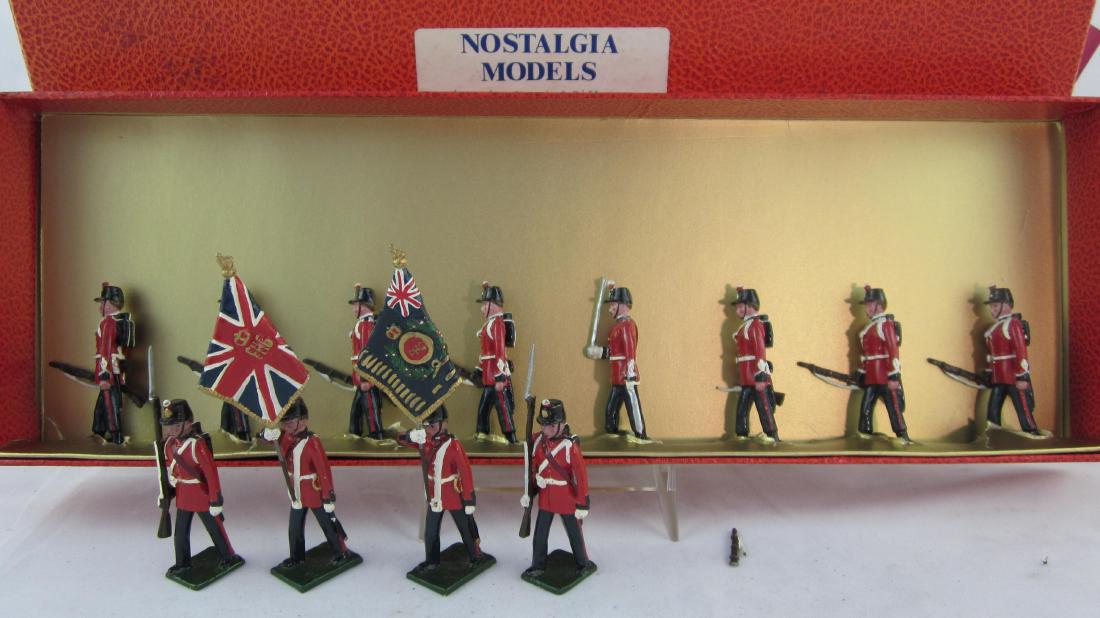 Nostalgia Royal Newfoundland & Fort Henry.: 2 sets, #N259 Royal Newfoundland Volunteer Rifles with Fort Henry Guard Colour Party. 12 pieces. Condition excellent but 1 rifle broken but present. 1 box is the wrong box for these sets.