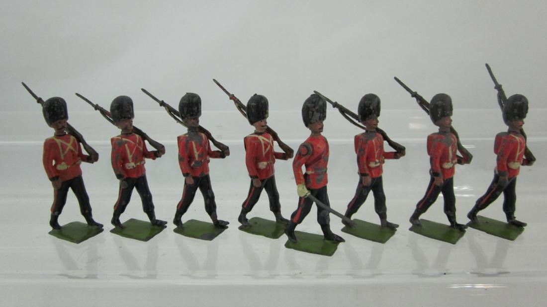 Britains Set #7 Royal Fusiliers Dated 1905.: Early Royal Fusiliers, 1/2 boots, box packs, loose sling rifles, bases dated 1905. 8 pieces. Condition good, 1 mismatched. No box.