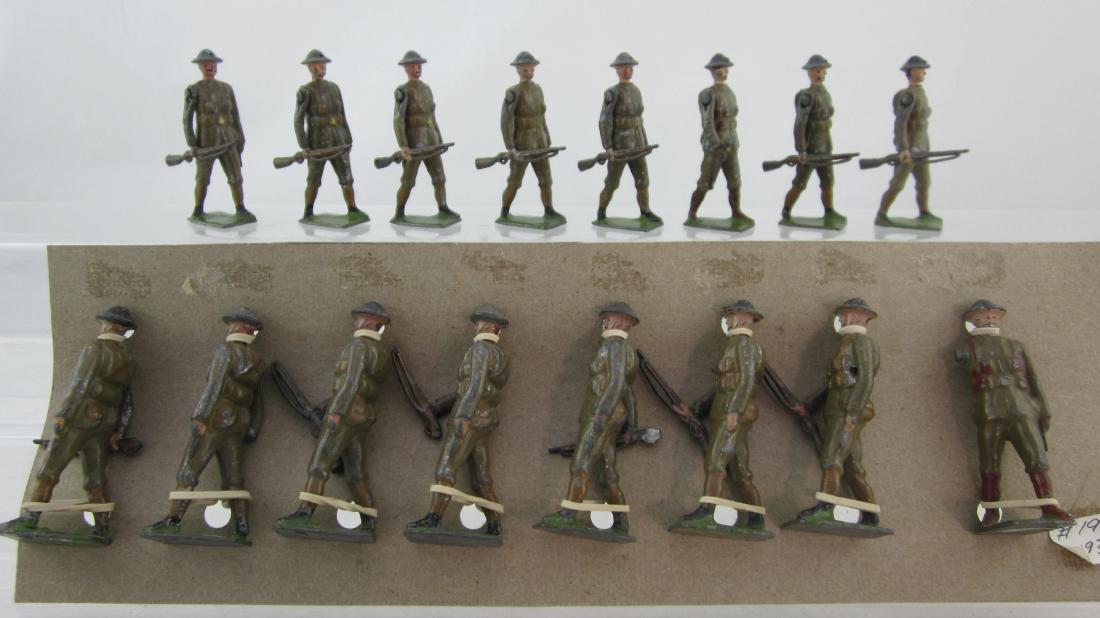 2 Sets #258 British Gasmask Infantry At Trail.: Gasmask Infantry at trail. 16 pieces. Condition good, 1 officer arm gone, 1 hand & rifle gone, 3 rifle butts gone. No box.