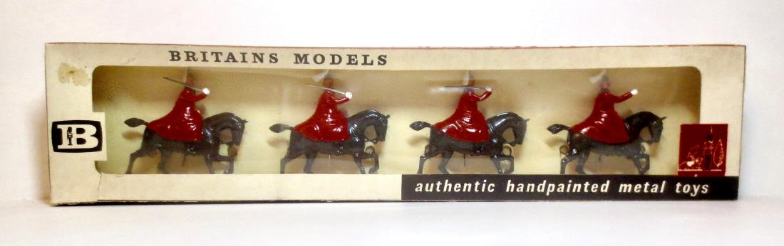 Britains #9205 Life Guards Mounted in Cloaks: 4 pieces. Mint still tied in the box. Post war, in window box. Box good (loose cellophane window).