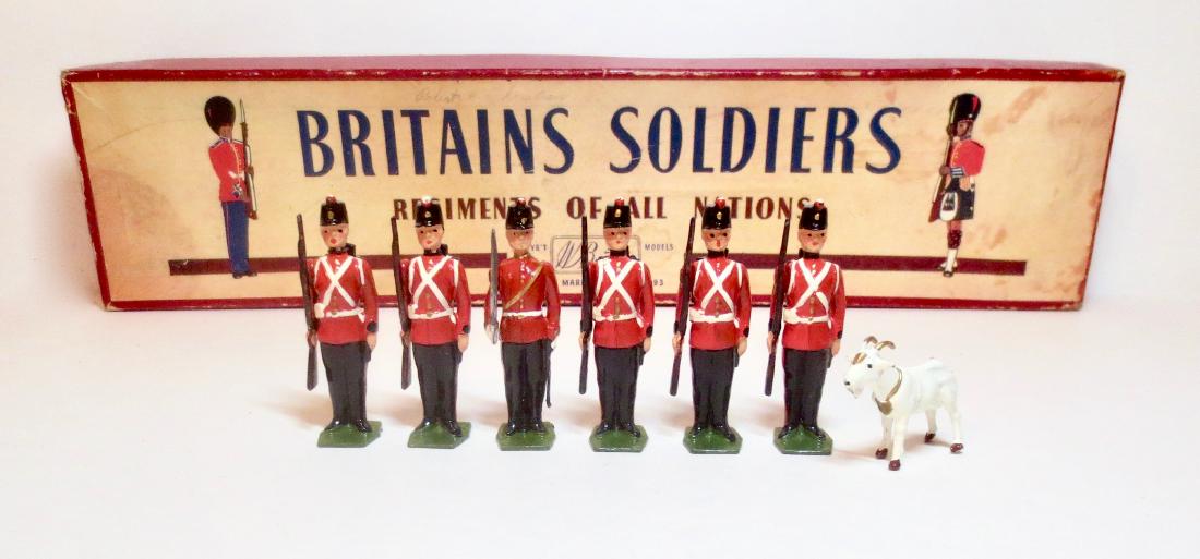 Britains #2148 Fort Henry Guard with Mascot: 6 pieces. Excellent condition. Post war, in ROAN box. Box good (some staining on top).