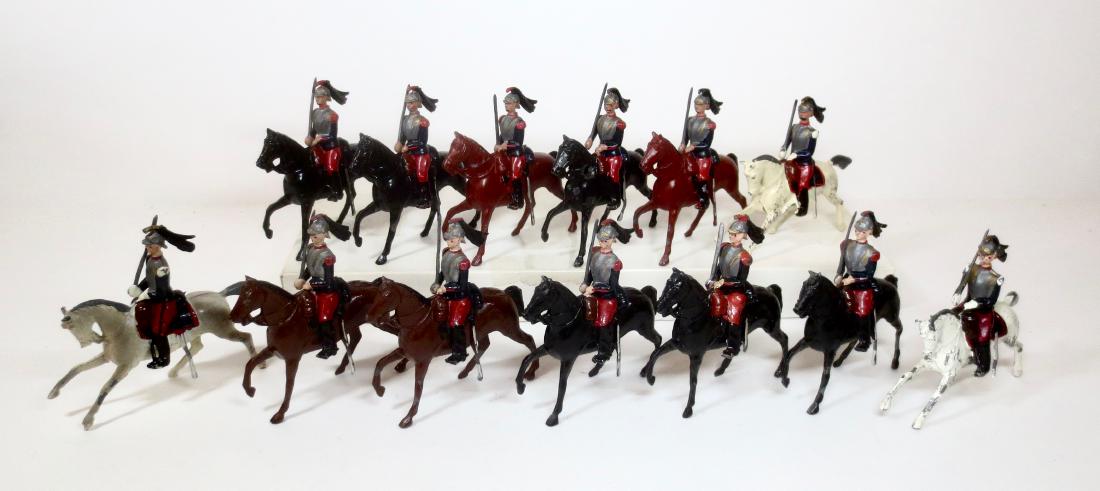 Britains From #138 French Cuirassiers: 13 pieces. 6 Pre war. Excellent to good condition (Hole in one horse side). 7 Post war. Excellent to very good condition (some paint loss on a few figures). Unboxed.