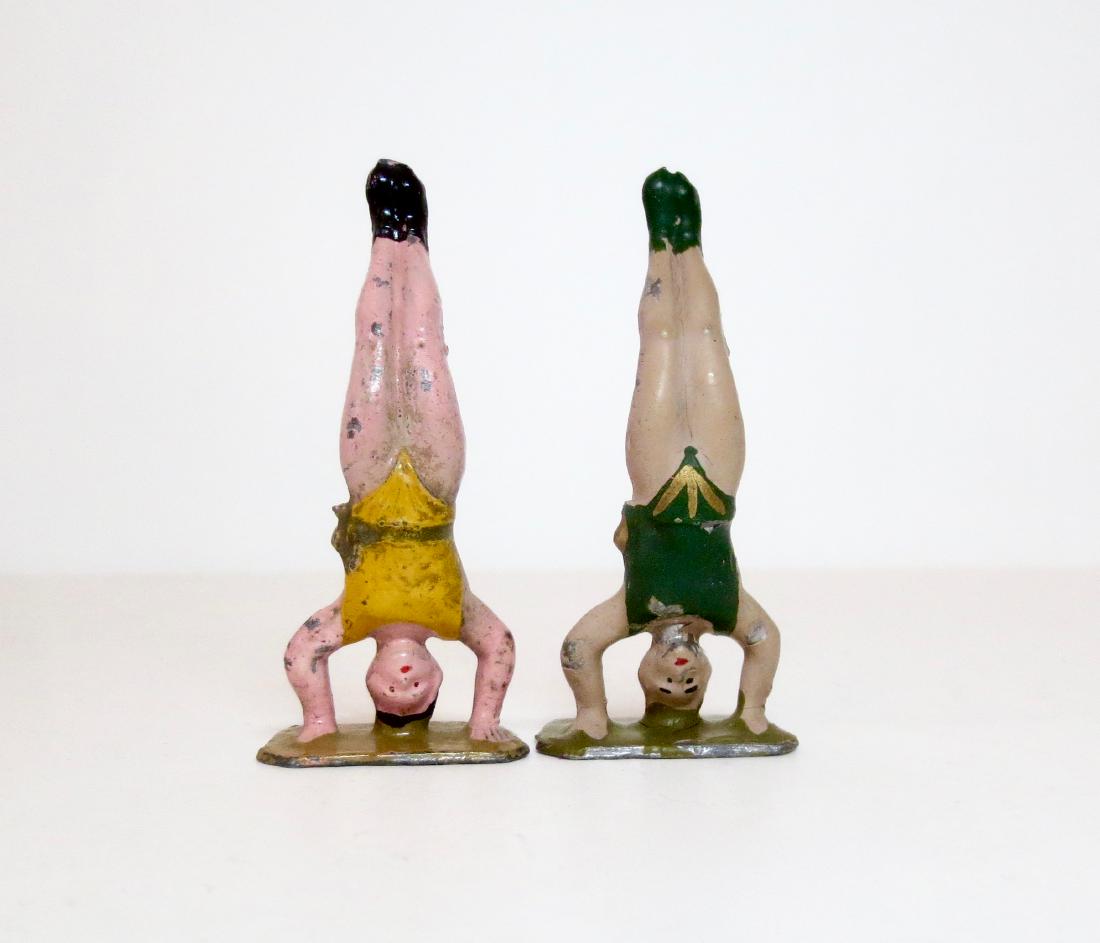 Maker Unknown Circus Acrobats Doing Headstands (1 of 1)