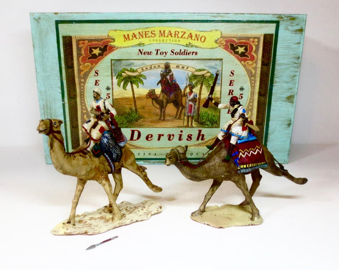Manes Marzano Series #5 Dervish: 2 pieces. Very good to good condition (one loose arm on figure with rifle, and one loose head and broken spear on second Dervish - included for repairs). Housed in a beautifully crafted wooden box, in