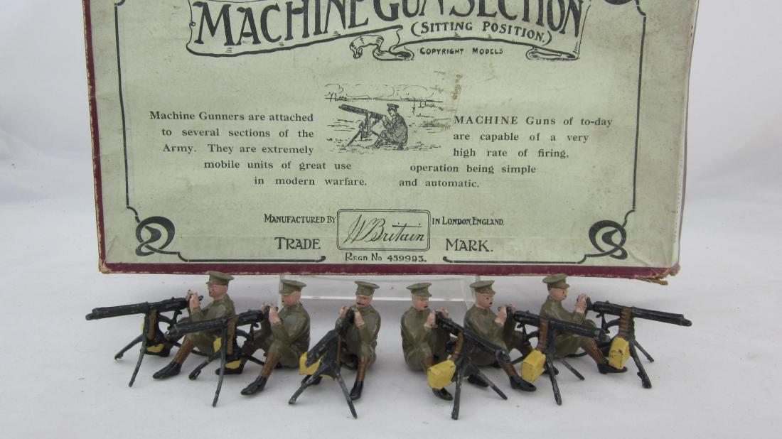 Britains Set #198 Sitting Machine Gun Section.: Peak cap Machine Gun Section, the rare 12 piece set issued only 1939-1940. Condition near mint in good illustrated box. Tough to find this 6 gunner version.