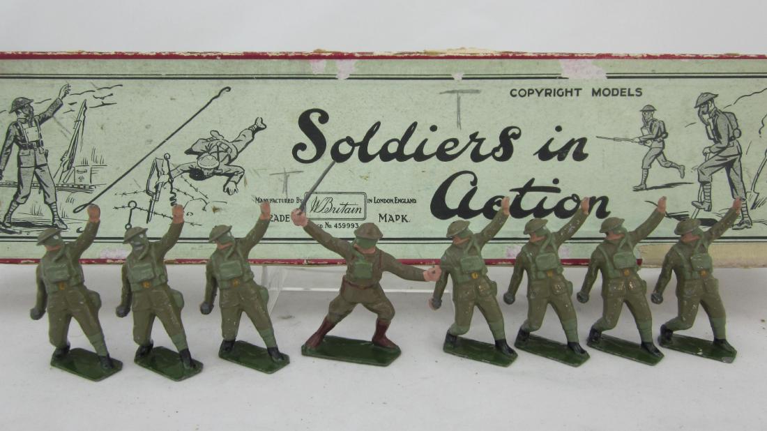 Britains Set #1612 British Infantry In Gasmasks.: British Gasmask Infantry tossing grenades. 8 pre-war pieces. Condition excellent, officer tunic mismatched to grenaders. Box condition is good, taped tray & lid, no tie card.