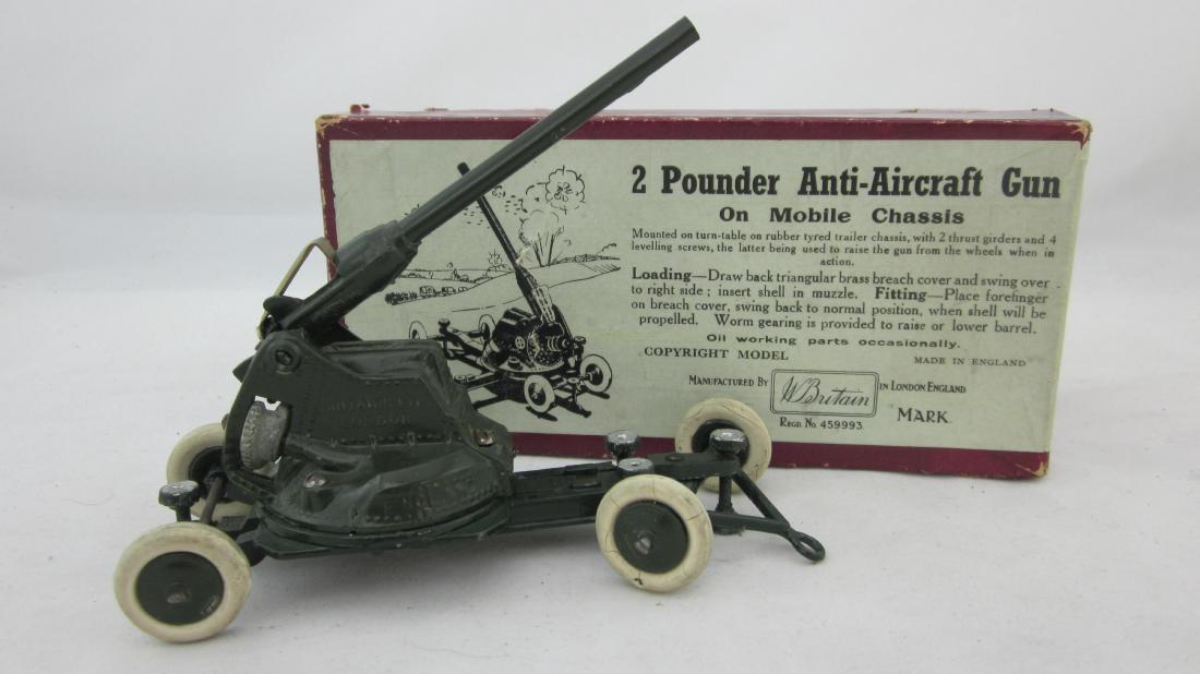 Britains Set #1717 Mobile Anti-Aircraft Gun.: AA Gun on mobile chassis in dark green. 1 piece. Condition excellent in very good red box.