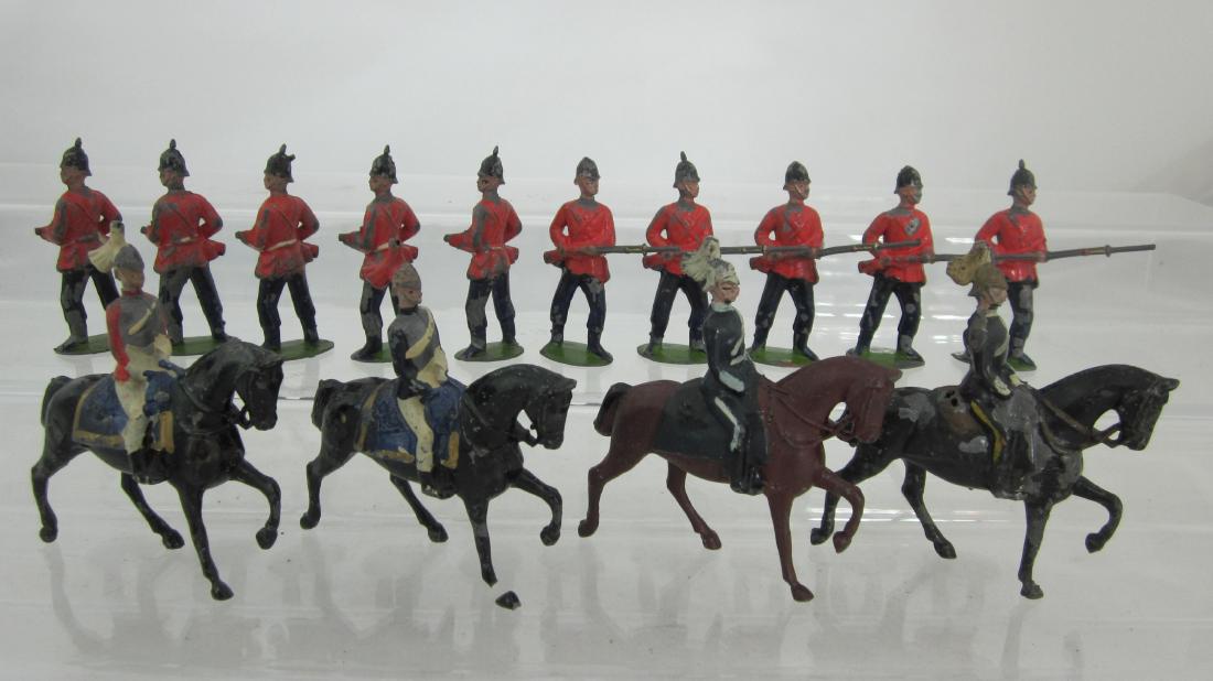 Britains X Series Cavalry & Infantry Assortment.: X Series 2nd grade 6th Dragoon Guards, Lifeguard & Horse guard, along with 10 2nd grade East Kent Regiment at Ready, 1st version round base circa 1900 figures. 14 pieces. Condition good, 3 helmet spik