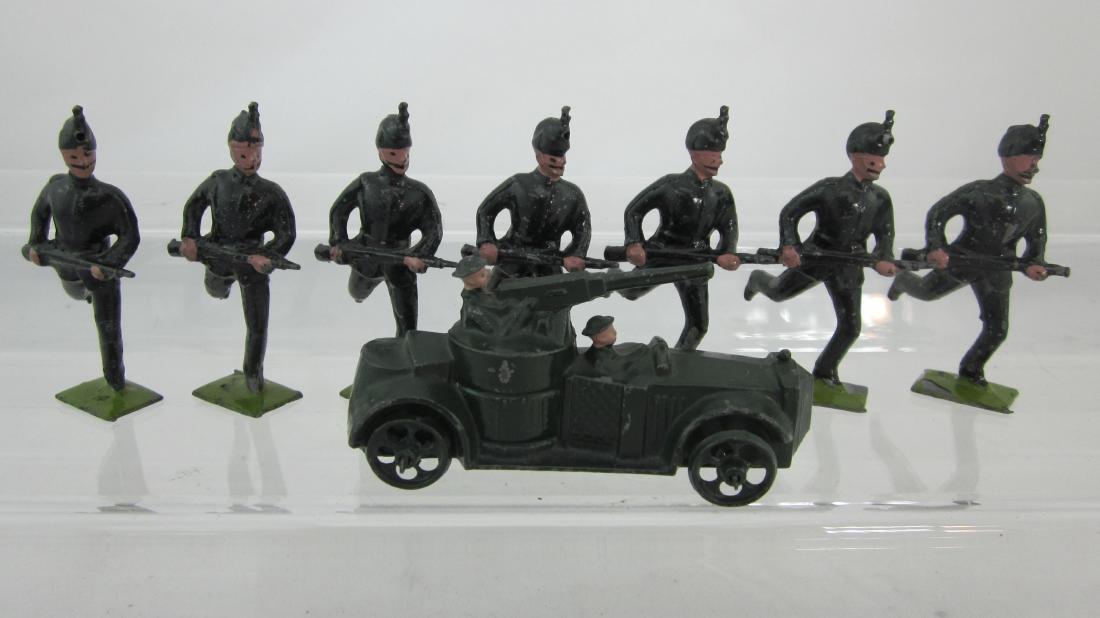 Britains 2nd Grade D & H Series Assortment.: #27D Armored Car & 4 of #33H Rifle Brigade charging. 8 pieces. Condition very good-excellent, 1 minute tip of 1 rifle gone.