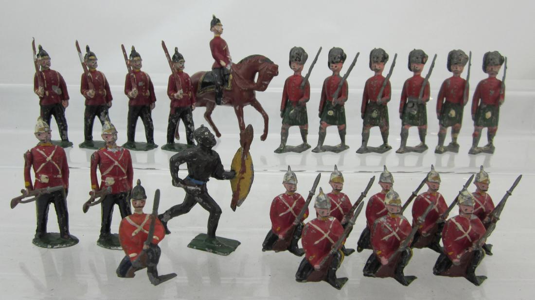 Early Hanks Medley of Redcoats.: Early Hanks (sued by Britains for figure piracy & imitation) Line Infantry, Highlanders & a Zulu. 23 pieces. Condition good-very good, 1 bayonet, 1 rifle butt gone. Circa 1915. No box.