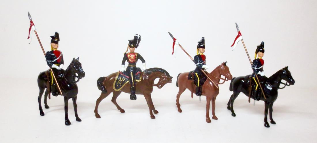 Britains From #24 9th Royal Lancers: Britains 9th Queen's Own Royal Lancers at the halt, with Mounted Officer turned to side in saddle. Post war. 4 pieces. Excellent to very good (officer's sword is broken but included for repair). Unbox