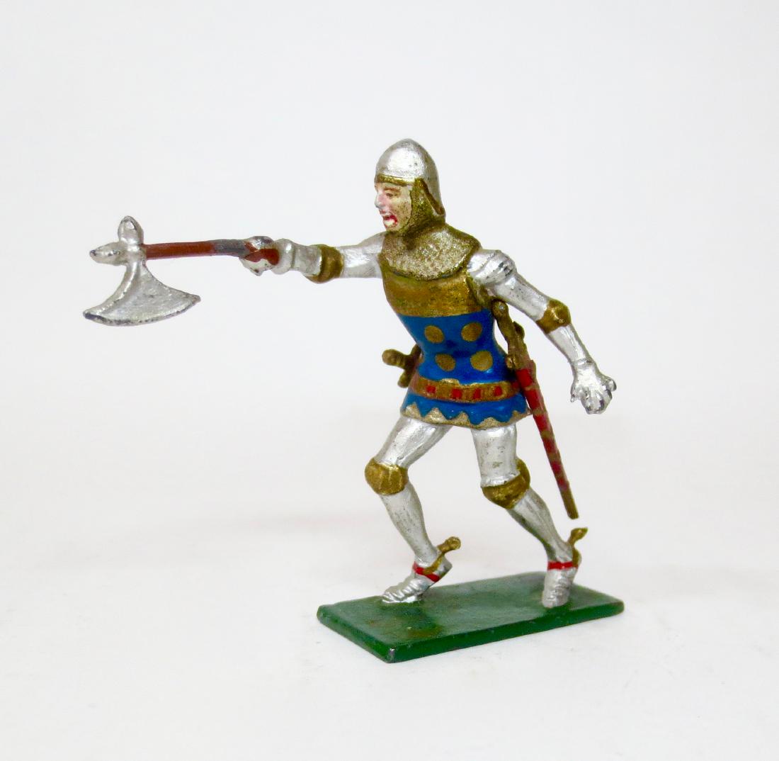 Courtenay RARE Erle of Tancarville: Position 7Courtenay Erle of Tancarville with Battle Axe. Green base with gold lettering. Signed by Richard Courtenay on bottom of base. 1 piece. Near mint condition.