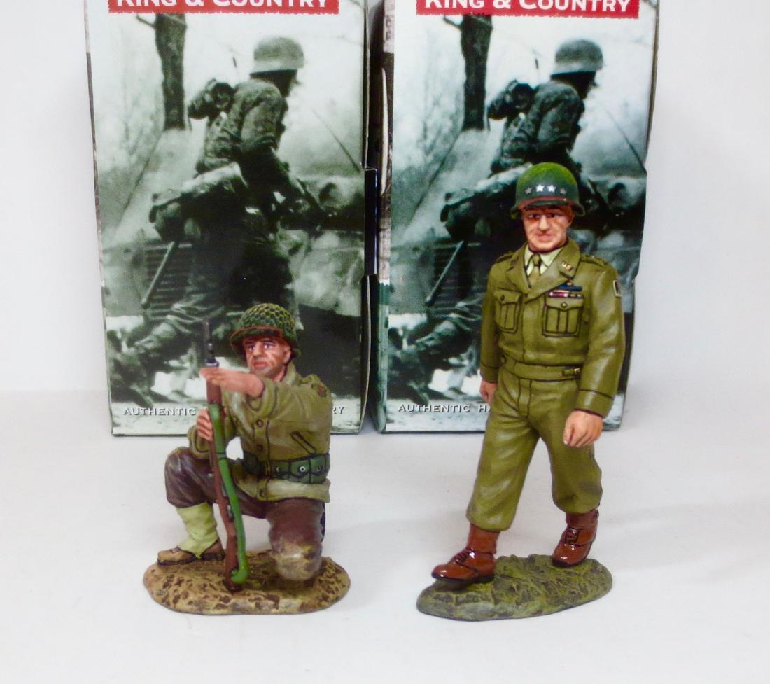 King & Country #DD158 & #DD187: King & Country "General Omar Bradley inspecting the troops", and a "D-Day G.I. crouching and pointing". Retired figures. 2 pieces. Excellent condition. Boxes excellent.