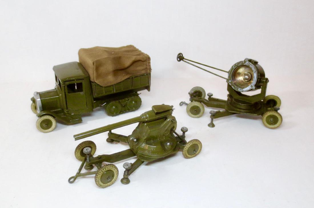 Britains Army Assortment #1433, #1717 & #1433: Britains Pre war Covered Army Tender (#1433) in excellent condition, Army Anti-Aircraft 2 pounder gun on Mobile Chassis (#1717) in excellent condition, and Searchlight on Mobile Chassis (#1718) in fai