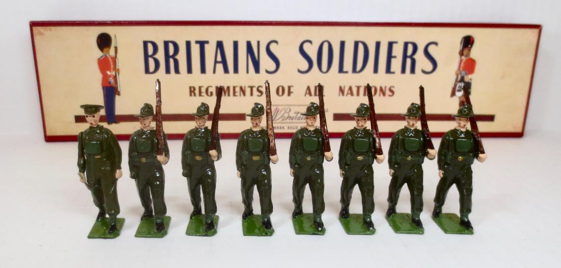 Britains #2031 Australian Army Infantry: Battle Dress Marching Slope Arms. Post war with R.O.A.N. box. 8 pieces. Excellent condition. Box very good (missing tie card).
