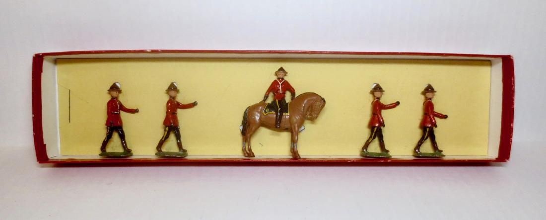 Britains From #1554 Royal Canadian Mounties: Post war. 5 pieces. Excellent condition. Re tied to plain card (box bottom only).