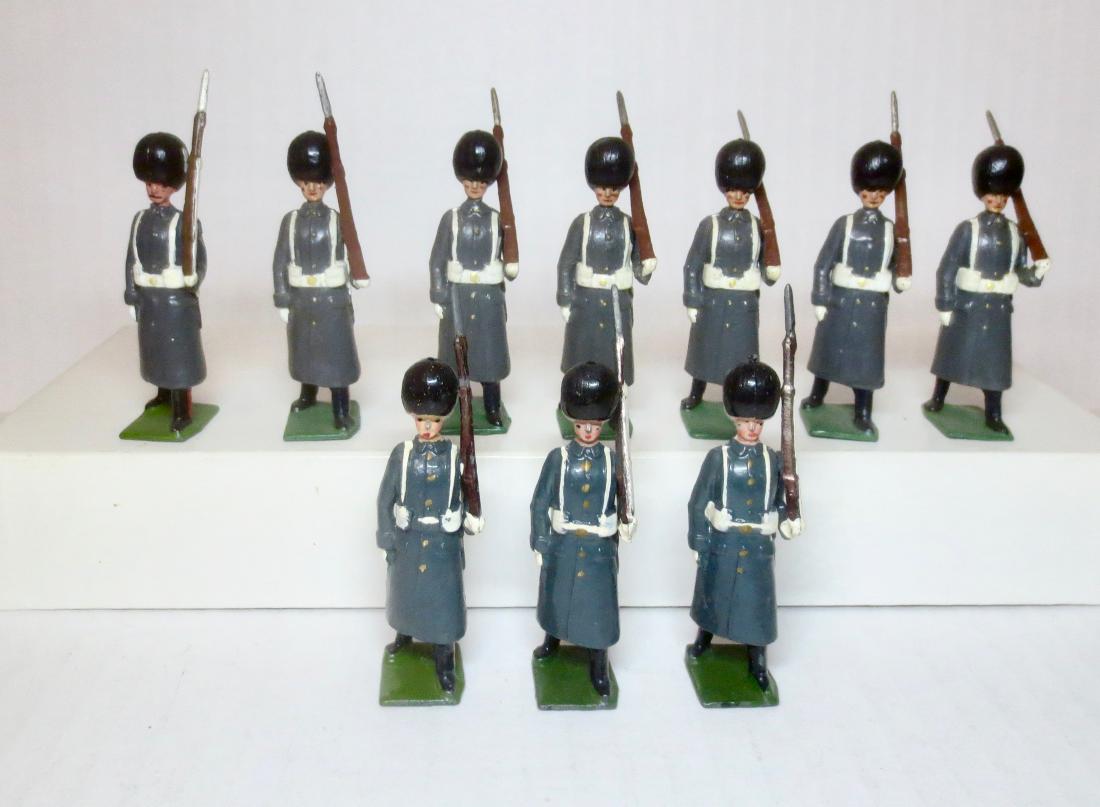 Britains From #312 Grenadier Guards: Winter Overcoats. Post war. 10 pieces. Good to fair condition (top row has been repainted). Unboxed.