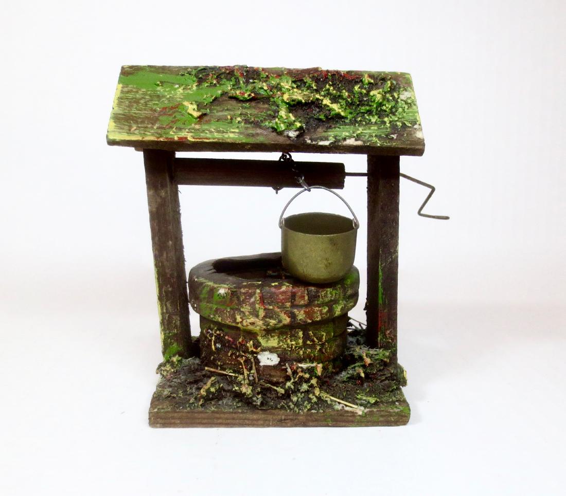 Elastolin Composition and Wood Well (1 of 1)