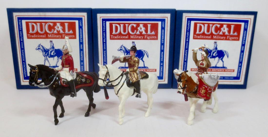 Ducal DH5002, MT5002, & DOM5001 Musicians: 3 pieces. The Lifeguards Mounted Director of Music, Mounted Trumpeter, and Drum Horse. All near mint condition. Boxes excellent.
