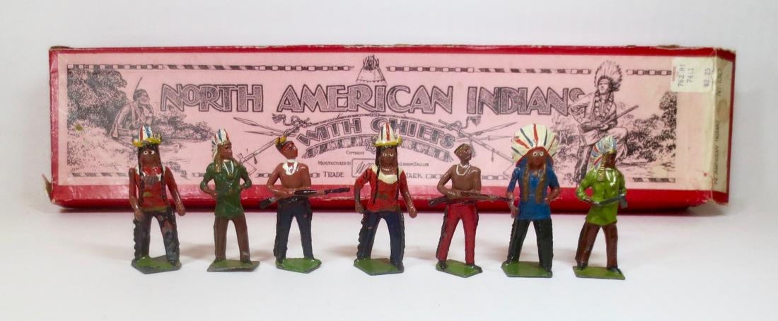 Britains #150 North American Indians with Chiefs: Indian Chiefs and Braves. Pre war with Illustrated box. 7 pieces. Very good to fair condition (some paint loss, one broken hatchet, and one Brave missing feathers). Box fair, with top corner splits.