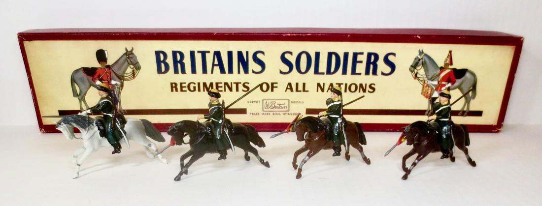 Britains From #136 Mounted Cossacks: Russian Cavalry. Post war, 1960 version with ROAN box. 4 pieces. Excellent to very good condition. Box very good.