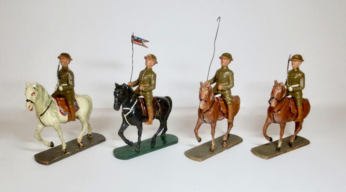 Elastolin Mounted U.S. Cavalry: Elastolin U.S. Cavalry with Officers and Flagbearers. 4 pieces. Very good to fair condition (with some paint loss and cracks). Unboxed.