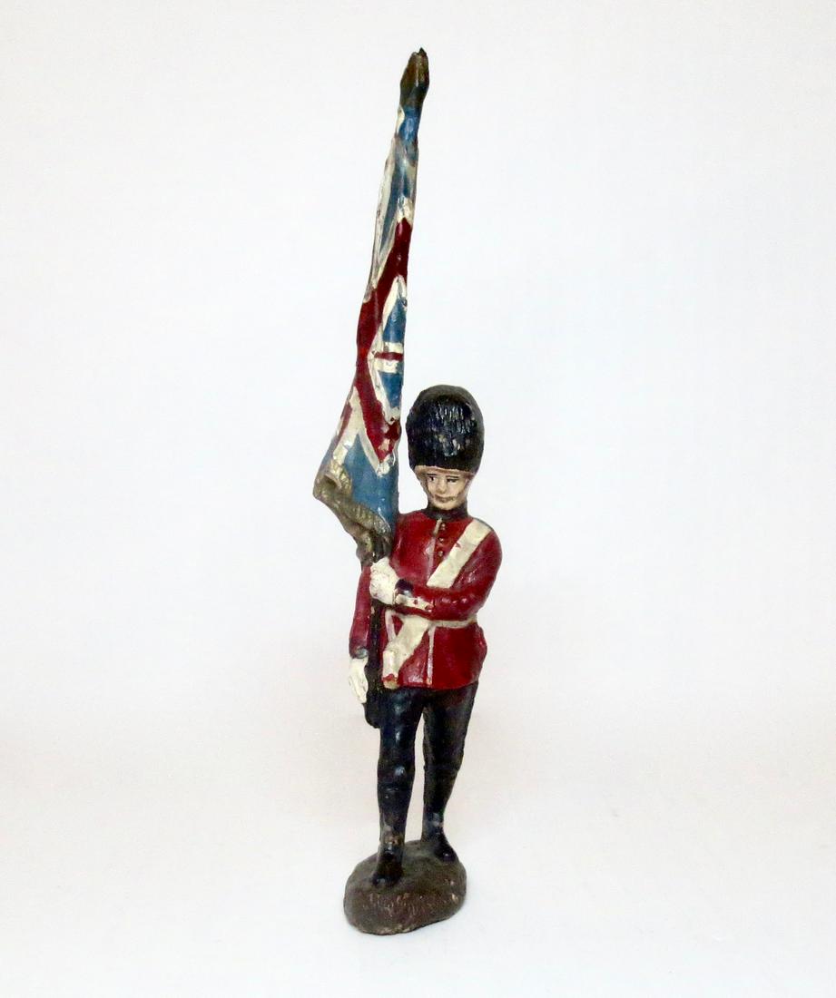 Elastolin Large Scale British Guard with Flag: Large scale British Guard with Flag. Measures 170mm to the top of flag. Excellent condition. Unboxed.