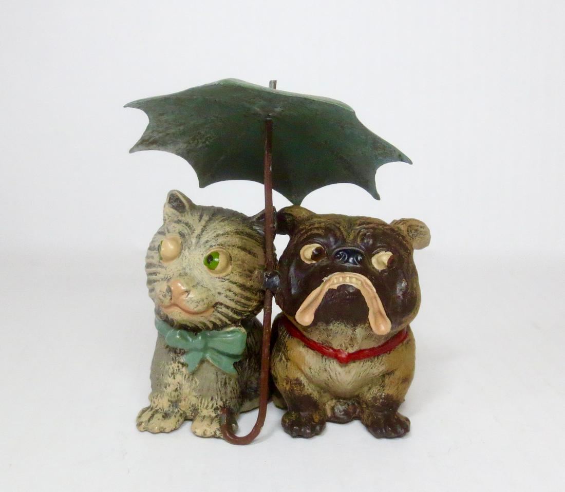 Heyde RARE Dog & Cat with Umbrella: Heyde Rare Nick Nack 100 mm Dog and Cat under Umbrella. Wonderful expression on their faces. 1 piece. Excellent condition.