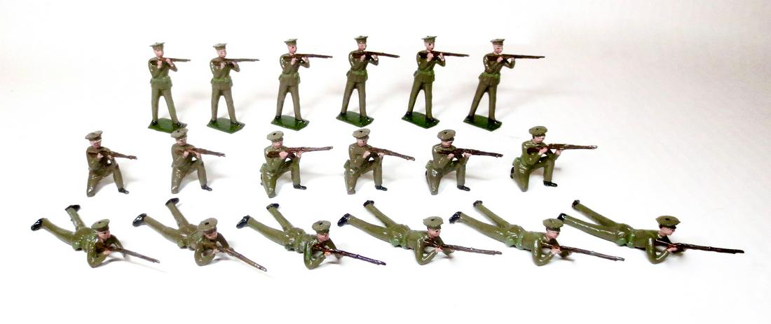 Britains #1328 British Infantry Display Set: British Infantry Standing, Kneeling and Lying (Firing) in Khaki uniforms with Peak Hats. Pre war. 18 pieces. Excellent condition. Retied in Types of the World Armies (Green) box. Box fair (stains, spl