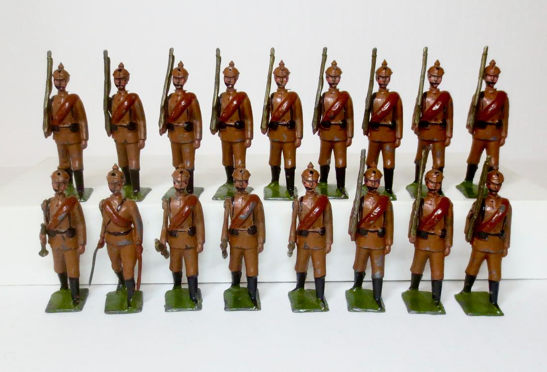 Britains RARE Paris Office Prussian Infantry: VERY RARE Paris Office Prussian infantry in Khaki Service Dress uniforms. Pre war, circa 1914. Including; Officer, Bugler, plus eleven Infantry at the Slope, and three at the Trail. 17 total pieces. E