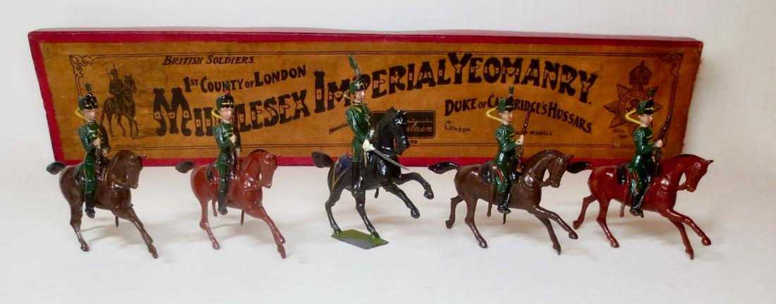 Britains RARE #83 Middlesex Yeomanry: Very Rare 1st County of London, Middlesex Imperial Yeomanry Duke of Cambridge's Hussars. Pre war 3rd version with long carbines, in original Whisstock illustrated label box. 5 pieces. Excellent condit