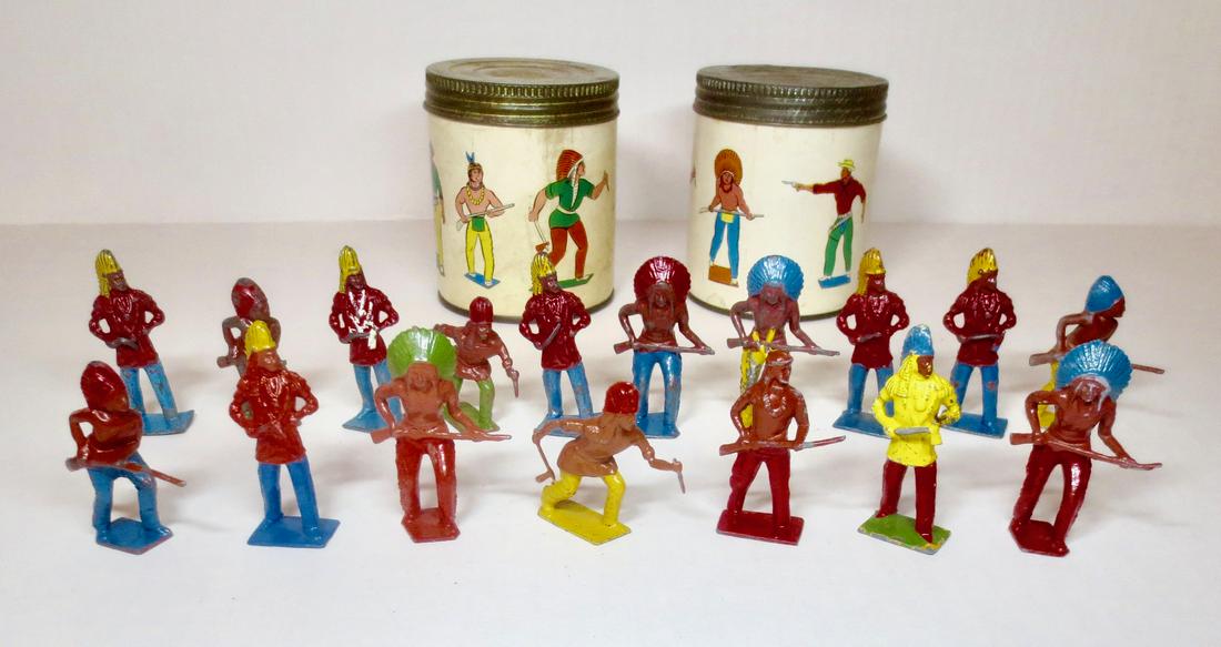 Britains Wild West Tins and Figures: RARE Cardboard and Tin packaging with colorful illustrations, plus 17 2nd grade Cowboys and Indians. Post war. Excellent (10) to fair (7 with broken weapons) condition. Tins very good.