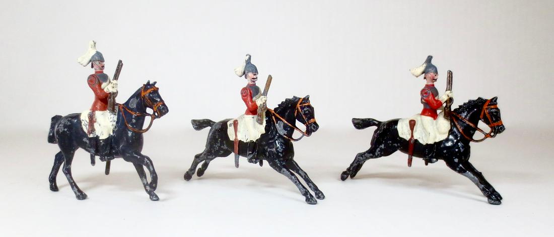 Britains RARE Paris Office Mounted Life Guards: Paris Office Life Guards Mounted, two at the gallop and one walking with short rifles. Pre war. 3 pieces. Fair condition with paint wear. Unboxed.