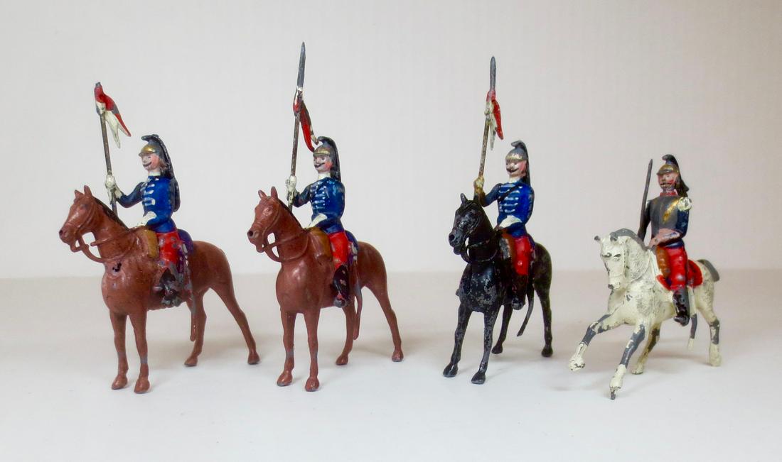 Britains RARE Paris Office Dragoons: Paris Office French Cavalry Dragoons at the Halt, with Officer on prancing horse. Pre war. 4 pieces. Good to fair condition (some paint loss, and one Trooper's Horse has a hole in it's front). Unboxed