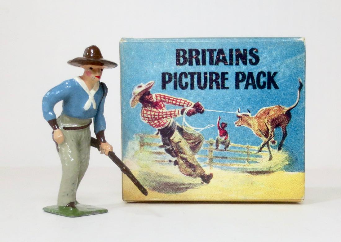 Britains #25B Cowboy Picture Pack: Cowboy with Long Rifle Picture Pack figure. Post war, in original illustrated box. 1 piece. Excellent condition. Box excellent.