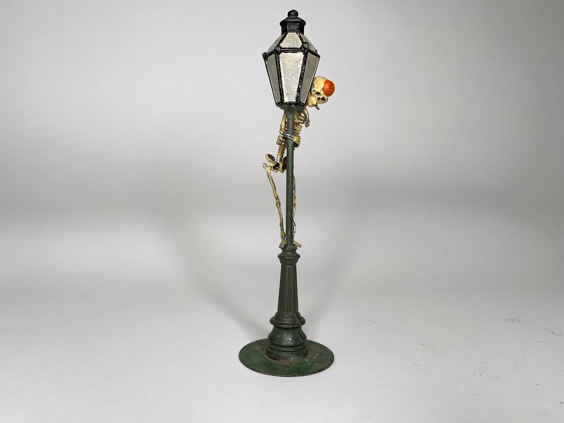 Heyde Skeleton on Lamppost: 6 1/2 inches tall. 1 Piece. Condition Excellent.