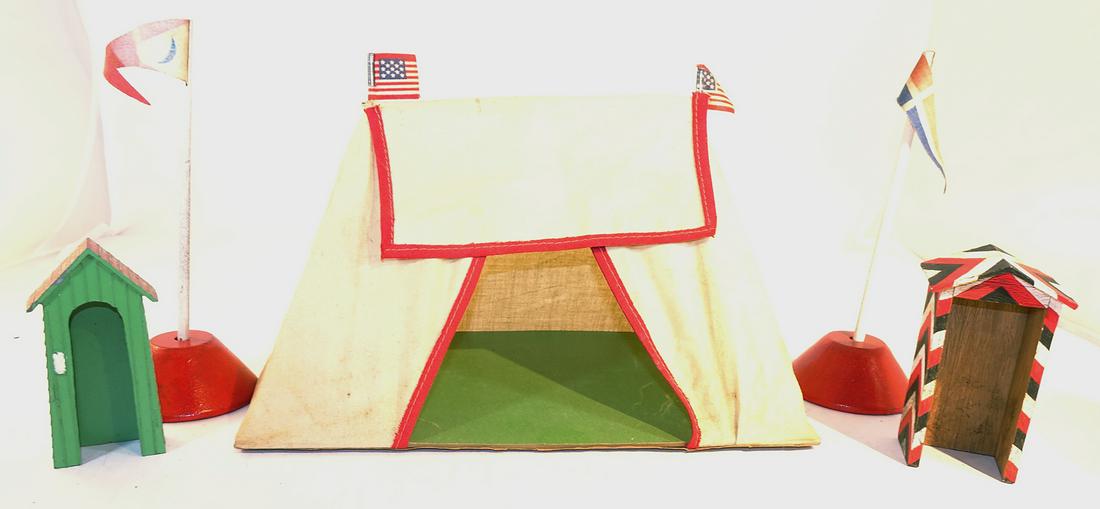 Tent and Others: 5 pieces, tent (cloth on cardboard base) is 9" long, 5 1/2" high, 2 wood flagpoles have bases that come off, one guardhouse is metal, one composition, all unmarked, condition Excellent