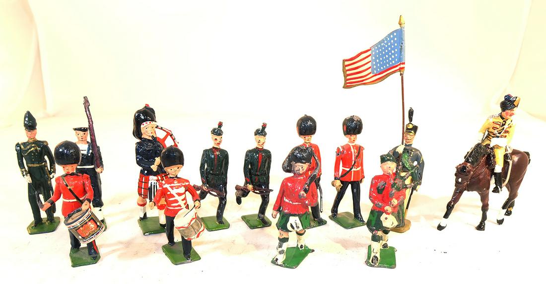 Miscellaneous Britains and Cherilea: 13 figures, Britains Queen's archer, sailor, piper, 2 rifle corps, Guards officer, Guards band bugler & 2 drummers, solidcast Indian army mounted, 2 JoHillco pipers, Mignot West Point Cadet flagbearer